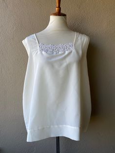 Beautiful Ivory tunic top with floral embroidery detail.  --- Condition: Great vintage condition  --- Size: Large  --- Tunic Wedding Dress With Intricate Embroidery, White Tunic Dress With Intricate Embroidery, White Floral Embroidered Festive Tunic, Embroidered Tunic Summer Cover-up, White Embroidered V-neck Tunic, Bridal Nightgown, Embroidery Details, Womens Tunics, Tunic Top