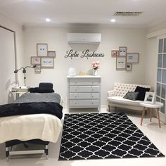 a white room with black and white decor