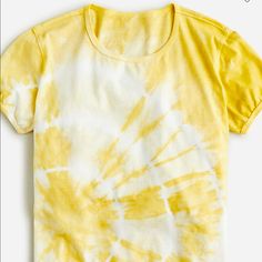 a yellow and white tie - dye shirt with the word,