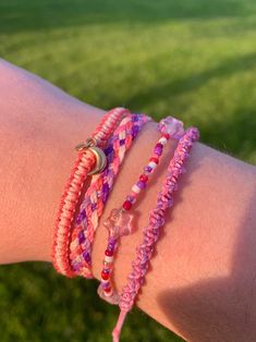 This set of four bracelets contains one stretchy beaded bracelet along with three waxed cord bracelets.  The first bracelet is a light pink and rose bracelet with a gold moon charm. The second bracelet is a five strand braid with light pink, rose, neon purple, lavender and pink strings. The third bracelet is beaded bracelet with translucent purple/pink star beads, and the last bracelet is a pink and lavender spiral bracelet!  This set is perfect for anyone who loves the night sky!  These bracelets great for teens or adults!  They are adjustable to fit everyone, handmade with Brazilian waxed cord, waterproof and durable! Great gifts for family or friends!  Adjustable bracelets are approximately 5.5in-8in Stretchy beaded bracelet is approximately 7in Pink Adjustable Spiritual Braided Bracelet, Pink Hand-strung Braided Bracelets As Gift, Bohemian Pink Friendship Bracelets With Tiny Beads, Pink Beaded Braided Bracelet For Friendship, Bohemian Adjustable Pink Wrap Bracelet, Adjustable Pink Bohemian Wrap Bracelet, Trendy Adjustable Pink Braided Bracelet, Adjustable Bohemian Pink Wrap Bracelet, Trendy Pink Adjustable Braided Bracelet