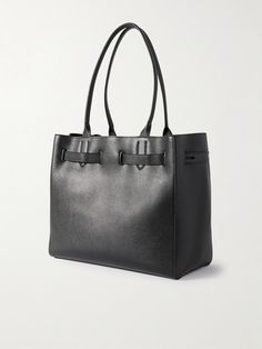 Find TOM FORD Medium Textured-leather Tote on Editorialist. TOM FORD's sleek and sophisticated tote is just as suited for days at the office or nights in the city. It's made from textured-leather with a glossy sheen and has an adjustable strap threaded through the open top. The handles fit comfortably over the shoulder. Stow your wallet, sunglasses case and tablet inside. Business Leather Shoulder Bag With Grained Texture, Leather Shoulder Bag With Grained Texture For Business, Office Leather Shoulder Bag With Grained Texture, Black Textured Leather Structured Shoulder Bag, Black Structured Textured Leather Shoulder Bag, Structured Black Textured Leather Shoulder Bag, Modern Leather Shoulder Bag With Grained Texture, Classic Office Bag With Grained Texture, Elegant Business Shoulder Bag With Grained Texture