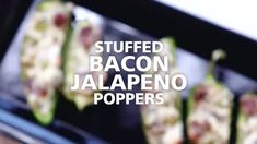 stuffed bacon jalapeno poppers are lined up on a tray with the words stuffed bacon jalapeno poppers