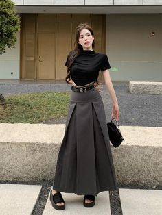 Features: Stylish and trendy long skirt, exuding a fashion-forward look 👚🌟 Made with high-quality fabric for ultimate comfort and breathability 😍🌸 Beautiful gray color, adding a touch of elegance to any outfit 🌈👌 Flattering and flowy silhouette, perfect for any body type 💃🌟 Designed with Korean fashion sensibilities, paying attention to intricate details 🎀🌼 Versatile Styling Options: Ideal for both casual outings and formal occasions 🎉🌸 Pair it with a chic blouse or crop top for a sophisticated ensemble 👚🔥 Dress it down with a casual t-shirt or sweater for a relaxed yet stylish look 👕🌟 Blouse And Long Skirt Outfit, Crop Top Outfits With Skirt, Korean Skirt Outfits Long, Outfits With Flowy Skirt, Japanese Long Skirt Outfit, Long Gray Skirt Outfit, Japanese Long Skirt, Korean Elegant Outfit, Long Skirt And Shirt