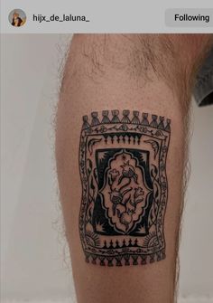 a man with a tattoo on his leg