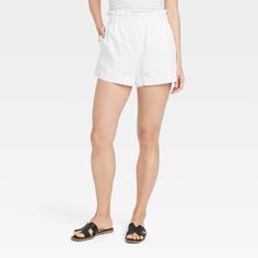 These High-Rise Linen Pull-On Shorts from A New Day™ made from lightweight material in a casual fit make a cool and comfy pick for the sunniest of days. They're designed with a full elastic waist for easy wear, while the side pockets add functional flair. Pair with tucked-in tees and sandals for effortless style. A New Day™: Style that goes wherever you do. Relaxed Bottoms With Built-in Shorts For Summer, Relaxed Fit Bottoms With Built-in Shorts For Warm Weather, Relaxed Spring Bottoms With Built-in Shorts, Casual Bottoms With Elastic Waistband For Warm Weather, Casual Bottoms With Built-in Shorts For Warm Weather, Warm Weather Cotton Shorts With Elastic Waistband, Cotton Shorts With Elastic Waistband For Warm Weather, Cotton Bottoms With Elastic Waistband For Warm Weather, Trendy Summer Shorts With Elastic Waistband