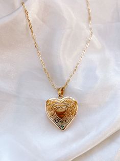 The heart locket charm necklace comes with three different options. This is a real locket, so be sure to print out pictures of your family, besties, boyfriend, girlfriend, wife, husband, dog ETC!! This is the perfect chic statement piece to add to your collection! add “add pictures of me” to your cart and send me two pictures to airotcivbyvictoria@gmail.com and make a note a checkout and I will put your pictures in your new locket. Heart Shaped Locket Aesthetic, Print Out Pictures, Resin For Beginners, Diy Resin Coasters, Olive Necklace, Mermaid Locket, Pearl Rope, Add Pictures, Out Pictures