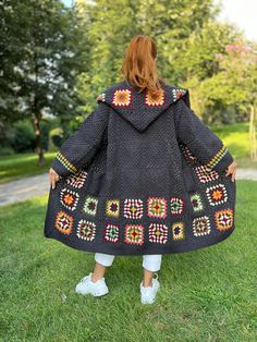 Anthracite Crochet Granny Square Coat With Pockets and Buttons  This patchwork hooded boho oversize jacket is made with special winter cotton yarn. It will keep you warm 🥰. This wool long sweater is a very stylish and great product for daily use. Also a great gift for your friends.🎁 📏Size of the cardigan in the photo: US size :14 (XL)!   📏The length of the cardigan in the photo is 100-110 cm (39-43 in).  📏Model's height is 5'5″ (165 cm), weight is 128 lbs (58 kg) Made of highest quality cot Hooded Crochet Outerwear For Winter, Vintage Granny Square Long Sleeve Outerwear, Vintage Long Sleeve Granny Square Outerwear, Bohemian Handmade Hooded Outerwear, Handmade Bohemian Hooded Outerwear, Black Bohemian Sweater Coat For Winter, Handmade Black Bohemian Outerwear, Black Bohemian Handmade Outerwear, Black Bohemian Long Sleeve Sweater Coat