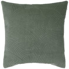 a green pillow on a white background