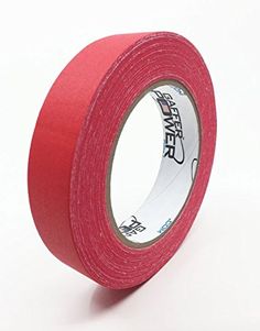 a roll of red tape on a white background