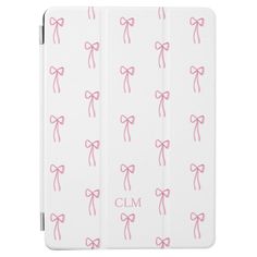 an ipad case with pink bows and the word clm written on it in white