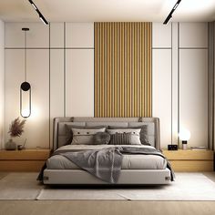 a bedroom with a bed, nightstands and two lamps on the wall above it