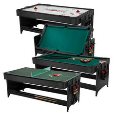 three black tables with green cloths and red flowers on them, one has a pool table in the middle