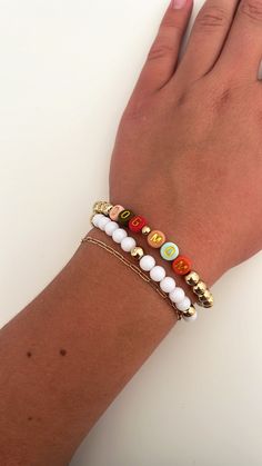 This is a super cute Dog Mom bracelet stack!! This set includes 2 bracelets. These bracelets are super strong and have been double wrapped and glued to ensure they won't break. These work perfectly for gifts and for all occasions! Disclaimer: the dainty gold chain is not included Dog Mom Bracelet Stack, Playful Gold Beaded Bracelets For Everyday, Trendy Personalized Beaded Bracelets, Trendy Personalized Beaded Bracelets For Everyday, White Name Bracelet Bangle For Friendship, White Friendship Name Bangle Bracelet, Playful Stackable Adjustable Jewelry, Adjustable Stacked Bracelets As Gift, Trendy Stackable Charm Bracelet Gift