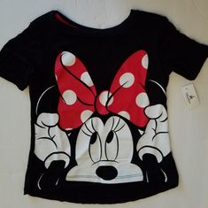 a t - shirt with a minnie mouse design on it