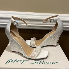 Betsey Johnson Sb-Ivan Ivory Satin Embroidered Ankle Strap Wedge Sandal. Size 7.5 New In Box. Excellent Condition. 4” Heel. Adjustable Ankle Strap Romantic Embroidered Details With Beads, Sequins And Sparkle. Blue Bottoms. Brand New. Perfect For Wedding Day, Or Special Occasion. See Photos For More Details. Thanks. Related Search Words: Heel, Heels, Wedge, Wedges, Sandal, Sandals, Bride, Bridal, Wedding, Ivory, Satin, Beading, Sequins, Bling, Runway, Glam, Something Blue. Special Occasion Shoes. Wedding Wedge Shoes, Clubbing Shoes, Bridal Wedges, Whimsical Shoes, Wedding Wedges, Heels Wedge, Wedge Wedding Shoes, Blue By Betsey Johnson, Rhinestone Pumps