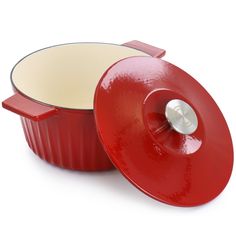 a red casserole dish with a lid on the side and a white background