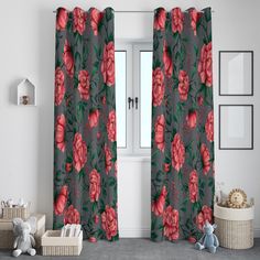 the curtains in this room are decorated with red flowers and green leaves, along with a teddy bear