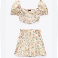 New With Tag Color: Floral Top Has Elastic In The Back And Zipper On The Side . Puffy Sleeves Skirt Open/Close Zipper On The Back And Is Full Lining Top Size: S Skirt Size: M Measures Approximately (Take Flat) Pit To Pit: 14” Top Length: 8 1/2” Waist: 13 1/2” Skirt Length: 17 1/2” Please Check Size And Measurements Before Buying All Photos Were Taken By Me Except The First And The Last Two That Are Used To Show How The Item Fits. Same Day Shipping Please Feel Free To Ask Any Question All Sales A Fitted Skirt Set For Vacation In Spring, Fitted Skirt Set For Spring Vacation, Summer Fitted Skirt Set With Short Sleeves, Chic Summer Skirt Set With Short Sleeves, Casual Summer Mini Skirt Set, Fitted Skirt Set With Short Sleeves For Summer, Fitted Short Sleeve Skirt Set For Summer, Casual Beige Floral Print Sets, Beige Floral Print Sets For Spring