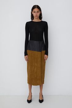 The contrast stitched leather waistband accentuates the buttery texture of this stand-out LEATHER AND SUEDE SKIRT. Fully lined. SIZE: Size 8-10 Aus MEASUREMENTS: Half waist 36cm / Half hip 46cm / Front length 80cm FABRIC: All Leather. Polyester Lining. COLOUR: Tan/Black BRAND: Covers CONDITION: Great, minor signs of wear.   Note: Scarlett is 175cm tall, this garment has not been clipped to fit. Leather Midi Skirt, Suede Skirt, Stitching Leather, Style Expert, Contrast Stitch, Black Suede, Favorite Outfit, Midi Skirt, Womens Skirt