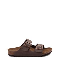 Comfortable Brown Slides With Arch Support, Brown Slide Footbed Sandals With Cork-bed Midsoles, Brown Slide Footbed Sandals With Cushioned Footbed, Brown Cushioned Slide Footbed Sandals, Brown Footbed Sandals With Arch Support For Outdoor, Brown Outdoor Footbed Sandals With Arch Support, Brown Slip-on Slides With Arch Support, Outdoor Brown Footbed Sandals With Arch Support, Brown Textured Footbed Slide Sandals