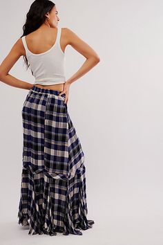 Perfect in plaid, this timeless skirt will never go out of style. **Fit:** High-rise, billowy column fit **Features:** Elastic waistband for pull-on ease, classic plaid print, asymmetrical frayed hemline **Why We ❤ It:** Toughened-up with moto boots or off-duty with sporty sneakers, this style has endless ways to wear. | Bordeaux Plaid Maxi Skirt by Free People in Blue, Size: S Plaid Skirted Bottoms For Summer, Plaid Cotton Relaxed Skirt, Spring Plaid Ruffled Skirt Bottoms, Chic Plaid Skirt, Chic Plaid Lined Skirt, Plaid Cotton Tiered Skirt Bottoms, Plaid Cotton Tiered Skirt, Plaid Maxi Skirt, Sporty Sneakers