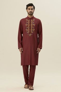 Maroon kurta with floral thread embroidery. Paired with a matching pant. - Aza Fashions Traditional Red Unstitched Suit With Floral Embroidery, Red Unstitched Suit With Floral Embroidery For Eid, Folk Traditional Wear With Embroidered Border For Eid, Folk Style Embroidered Festive Sets, Festive Folk Style Embroidered Sets, Folk Style Festive Kurta, Unstitched Red Lawn Suit With Floral Embroidery, Eid Folk Style Kurta With Intricate Embroidery, Folk Style Kurta With Intricate Embroidery For Eid