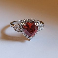 New 925 Silver Filled Heart Shaped Ruby Diamond Ring For Women Stamped 925. All Gemstones Are Simulated. A Jewelry Box Included. Ready To Ship Same Day. Feel Free To Ask Any Question. All Photos Are Real Time From Actual Object No Stock Photo Used. Color Might Be Slightly Different Due To Lighting. Red Diamond Ring, Silver Heart Jewelry, Garnet Wedding Rings, Garnet Wedding, Diamond Ring For Women, Cherry Jam, Ruby Diamond Ring, Red Stone Ring, Ruby Rings