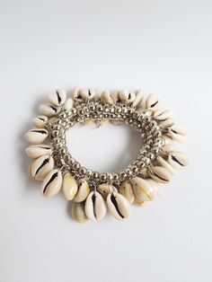 bohemian cowrie shell bracelet stack, summer bracelet set, stretch bracelet set, womans gift, beach funny jewelry, pulseiras de verão, boho Layering metal beads bracelets, you are buying 3 bracelets in this listing.  Each bracelet is 7.5 inches TAKE ADVANTAGE OF COMBINED SHIPPING Only 0.50€ (about 0.60 USD) for adicional item!! Handmade with love! Cheap Statement Bracelets For Beach, White Bohemian Stretch Bracelet For Festivals, Bohemian Shell Friendship Bracelets For Summer, Bohemian Cowrie Shell Bracelets For Beach, Cowrie Shell Beaded Bracelets For Vacation, Bohemian Shell Friendship Bracelets For Vacation, Bohemian Shell Bracelet For Vacation, Bohemian Shell Friendship Bracelets, Bohemian Cowrie Shell Bracelets For Summer