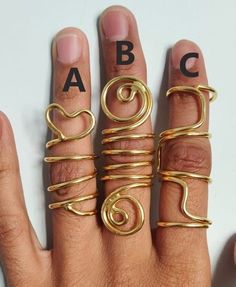 Trigger Finger Rings, Arthritis Ring, EDS Finger Splint Rings, Mallet Finger Rings, Adjustable Ring, Personalized Gifts, Unique Rings Size:- All Size Available In Variation Metal:-Brass 👇 If you have any question about size, then definitely go through it 👇 If you're knuckle is swollen, we recommend you Please tell me above and below size of your knuckle. Send me the photo of the finger in which you want to wear this ring. Write the above and below size of your knuckle in the Personalization box. I want to say one thing, do not adjust the ring after getting the order. This may lead to a breaking or distorted ring. And it's not my responsibility. And if there is any problem in size contact me. ❥ Customers satisfaction is our biggest priority, please contact us with any questions/queries fo Unique Gold Toe Ring For Gift, Unique Gold Toe Rings As Gifts, Handmade Gold Open Toe Rings, Metal Toe Rings Ideal For Gifts, Adjustable Gold Toe Rings, Adjustable Nickel-free Gold Toe Rings, Adjustable Metal Toe Rings As Gift, Metal Midi Rings With Unique Design As Gift, Unique Gold Wire Wrapped Ring