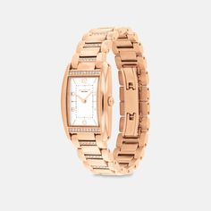 A distinctive stately design the minimalist Reese watch is an elevated choice for everyday. Sparkling with crystals this rose gold tone bracelet design features a satin dial detailed with a mix of numerical and stick markers. It’s accented with our Signature on the clasp for a heritage touch. | Coach Reese Watch, 24 Mm X 35 Mm - Women's - Rose Gold Bracelet Design, Minerals Crystals, Bracelet Designs, Quartz Movement, Accessories Watches, Quartz Crystal, Design Features, Markers, Gold Tones