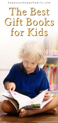 a little boy sitting on the floor reading a book with text overlay that reads, the best gift books for kids