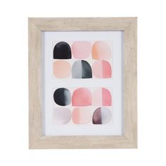 an abstract painting in white frame with pink, black and grey shapes on the wall