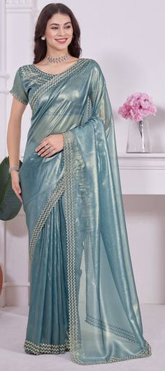 Blue color Saree in Shimmer fabric with Zircon work Blue Wedding Pre-draped Saree With Zari Weaving, Blue Pre-draped Saree With Pallu For Wedding, Blue Dola Silk Saree For Reception, Blue Pre-draped Saree With Self Design In Dola Silk, Light Blue Saree For Reception And Diwali, Elegant Blue Dola Silk Pre-draped Saree, Light Blue Saree With Pallu For Reception, Blue Tissue Silk Blouse Piece For Wedding, Formal Blue Art Silk Saree