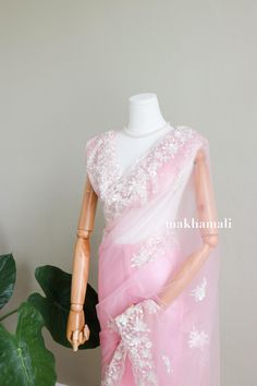 Super beautiful pastel pink net with white embroidery border. It looks heavy but is very easy and light to wear. Suitable for any asian occasion. Includes unstitched blouse which has heavy embroidery.  Please message for more information. Pink Semi-stitched Blouse With Intricate Embroidery, Pink Embroidered Unstitched Fabric For Reception, Pink Embroidered Fabric For Reception Blouse, Pink Embroidered Blouse With Traditional Drape, Semi-stitched Pink Net Saree, Pink Semi-stitched Net Saree, Semi-stitched Net Saree In Pink, Pink Blouse With Intricate Embroidery For Reception, Pink Blouse With Resham Embroidery In Traditional Drape