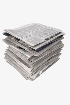 a stack of newspapers sitting on top of each other