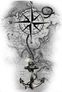 an anchor and compass on top of a map