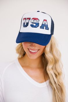 This USA hat is perfect for showing your American pride and spirit at the beach, gym, a hike, or just to cover up a bad hair day. The smiley face patch on the side is sure to put a smile on your face as well! Trucker Hat Product details: Snapback style Ponytail opening Mesh in the back of hat 100% Polyester All orders are currently shipping within 14 business days. To receive item quicker, expedited shipping is available at checkout. Blue Letter Print Trucker Hat For Beach, Blue Baseball Cap With Upf 50+, Adjustable Blue Baseball Cap With Uv Protection, Blue Summer Sports Event Hats, Blue Cap With Uv Protection, Fun Blue Trucker Hat With Letter Print, Blue Trucker Hat With Letter Print, Blue Trucker Hat With Curved Bill For Beach, Adjustable Blue Trucker Hat For 4th Of July