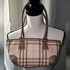 Authentic Vintage Burberry Mini Candy Nova Check Pink Beautiful Little Purse, Perfect For Everyday Use, Or Elevate Your Look For A Night Out. No Rips, The "Zipper Pull" Was Replaced By Another Burberry London. Please See The Last Photos Where The Very Faint Scuff Marks Are, Is Not Noticeable Until You Get Close To The Bag. The Inside Is Very Clean, And No Rips! Burberry Pink, Vintage Burberry, Burberry London, Burberry Bag, Mini Bag, Burberry, Night Out, Bag Lady, Im Not Perfect