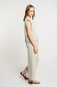 Our iconic Everyday Top is handcrafted from luxurious certified organic linen in new, Natural linen. This easy, minimalist top features a wide neckline, slightly boxy body, and mid-to-cropped length, perfect for tucking into our Everyday Crop Pant or wearing with your favorite jeans. We appreciate the natural beauty of linen's undyed color and are excited to highlight it this season in our new Natural colorway. Made with Organic Linen Lined with Organic Cotton Handmade in India Machine wash cold Versatile Cropped Linen Tops, Casual Neutral Linen Tops, Everyday Cropped Linen Top, Everyday Versatile Linen Tops, Versatile Linen Top For Everyday, Versatile Everyday Linen Tops, Relaxed Fit Linen Cropped Bottoms, Relaxed Fit Cropped Linen Bottoms, Everyday Neutral Linen Top