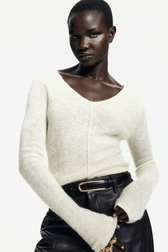 Slightly longer  fitted  knit sweater with mohair and wool content. V-neck at front and back  long sleeves  and visible seams. Oversized Knitted Jumper, Active Swimwear, Jean Short Jumpsuit, Fitted Jumper, Oversized Sweater Cardigan, Black Jumper, Blouse Jeans, Cardigan Sweater Jacket, Maternity Swimwear