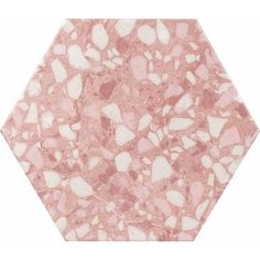 a pink marble hexagonal tile with white hearts on the top and bottom half