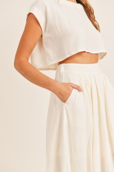 DescriptionFeel like a vacay goddess with The Santorini Set. Dress up or down with this beautiful set and you can be a casual gal on a Wednesday afternoon or a brunch babe on a Sunday morning. The Santorini skirt features a cinched elastic waistband, pockets, and cotton lining. And The Santorini top features side slits, a crew neck neckline, and a cropped fit. FitTrue to size. MaterialTop: 95% Rayon, 5% SpandexSkirt: 95% Rayon, 5% Spandex100% Cotton Lining Night Skirt, Bauchfreies Top, Night Tops, Crop Top Set, Midi Flare Skirt, Cotton Labels, Crop Top Skirt, Midi Length Skirts, Linen Skirt