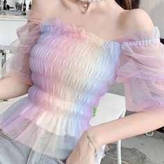 Our Pastel Rainbow Ruffle Blouse Is Made From A Tulle Fabrication, And Is Complete With A Rainbow Ombre Print, Shirred Elastic Body, Off The Shoulder Puffed Sleeves, And A Ruffled Hemline. Rainbow Ombre Print Off The Shoulder Design Sheer Tulle Sleeves Stretchy Bodice Length: 36cm / 14.17" Sleeve: 30cm / 11.81" Bust: 80-90cm / 31.5" - 35.4" #303 Pastel Kawaii Aesthetic, Sheer Lace Shirt, Rainbow Crop Top, Kristina Webb, Tulle Blouse, Chiffon Crop Top, Estilo Harajuku, Rainbow Top, Party Blouse