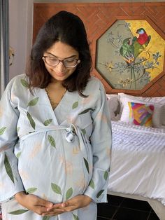 This is our maternity robe in our softest stretch jersey organic cotton. You can use it during pregnancy and later for nursing too. It will make an amazing gift for any mom to be.It works great for hospital gown as well. I can add buttons in the back for epidural. You can choose that option at the time of checkout.As for the fabric pattern, we have used a hand drawn and digitally painted technique. So they are all unique designs. And we got these designs printed on the softest Jersey knit stretc Cotton Nursing-friendly Sleepwear For Maternity, Cotton Nursing Friendly Sleepwear For Maternity, Cotton Maternity Sleepwear Nursing Friendly, Cotton Nursing Friendly Maternity Dress, Cotton Maternity Dress Nursing Friendly, Spring Cotton Maternity Dress, Blue Cotton Maternity Dress, Bump Friendly Cotton Maternity Dress, Maternity Long Sleeve Sleepwear