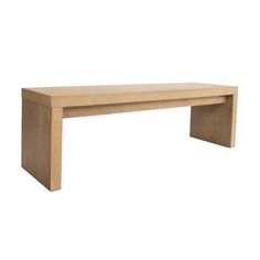 a wooden bench sitting on top of a white wall