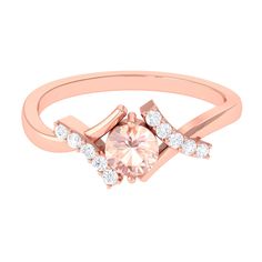 Product Details This delicate-styled Engagement Ring is a perfect way to express your commitment to lasting love for someone closer to your heart. A Round Shape Morganite is artfully set in a Prong Setting to enhance the look and embellished with Diamond stones accent. This Morganite Ring is crafted in Solid Gold Metal with shimmering Diamond. Product Information SKU SHP-RINGS082220476 Weight 2.24 gm (Approximate) MORGANITE INFORMATION No.of Stones 1 Pieces Total Weight 0.45 Carat (Approximate) Dimension(approx) Round-5X5 mm-1 Pcs Color Peach Cut Brilliant Shape Round Setting Type Accent Quality Grade AAA DIAMOND INFORMATION No.of Stones 10 Pieces Total Weight 0.22 Carat (Approximate) Dimension(approx) Round-1.40X1.40 mm-2 PcsRound-1.50X1.50 mm-8 Pcs Color HI Cut Brilliant Shape Round Sett Lasting Love, Morganite Engagement, Morganite Engagement Ring, Morganite Ring, 18k Yellow Gold Ring, Designer Engagement Rings, Diamond Stone, Morganite, Yellow Gold Rings