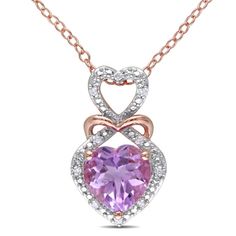 Express your love and commitment with this exquisite Rose de France and Diamond Interlocking Heart Pendant. Crafted in white and rose rhodium-plated sterling silver, this lovely pendant features a heart-cut (8mm) rose de france gemstone and 10 round-cut, prong-set diamond accents (G-H, I2-I3). This pendant is hung on an 18-inch cable chain and is secured with a spring ring clasp. Heart Halo, Triple Heart, Infinity Heart, Silver Heart Pendant, Halo Pendant, Pendant With Chain, Heart Pendant Diamond, Silver Heart Necklace, Silver Pendants