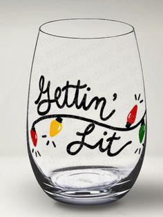 a wine glass with the words gettin'fit written on it