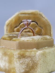 A classic & brilliant choice of a ring! This gorgeous and elegant 1.45 carats engagement ring has a 1.02 carat lab grown round brilliant cut center diamond and is IGI certified at "F" in color and "VS1" in clarity, (Excellent Cut, Polish and Symmetry) and is set in a classy hidden halo setting all in a 14k rose gold setting with micropaved side stones as well. The ring can also be made in white/yellow gold or platinum and can even be redesigned to your choice. Comes with EGI certification and ou Halo Setting, Metal Engraving, Hidden Halo, Halo Diamond Engagement Ring, Gold Set, Diamond Sizes, Micro Pave, Halo Diamond, Diamond Engagement Ring