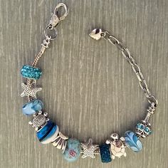 If You Love The Beach & Ocean - This Is For You! Beautiful Blue Color Crystal Beads Combined With Sliding Sea Turtles & Starfish Charms Perfectly Combined On An Adjustable Bracelet With Claw Clasp Closure New In Its Original Wrapping Smoke & Pet Free Home - - Check Out More Newly Added Items In My Closet Silver Beaded Ocean-inspired Bracelets, Ocean-inspired Silver Beaded Bracelets, Adjustable Silver Beaded Bracelet With Starfish Charm, Blue Charm Bracelets For The Beach, Silver Beaded Bracelet With Starfish Charm As Gift, Ocean Crystals, Edgy Bracelets, Peach Bracelet, Chunky Silver Jewellery